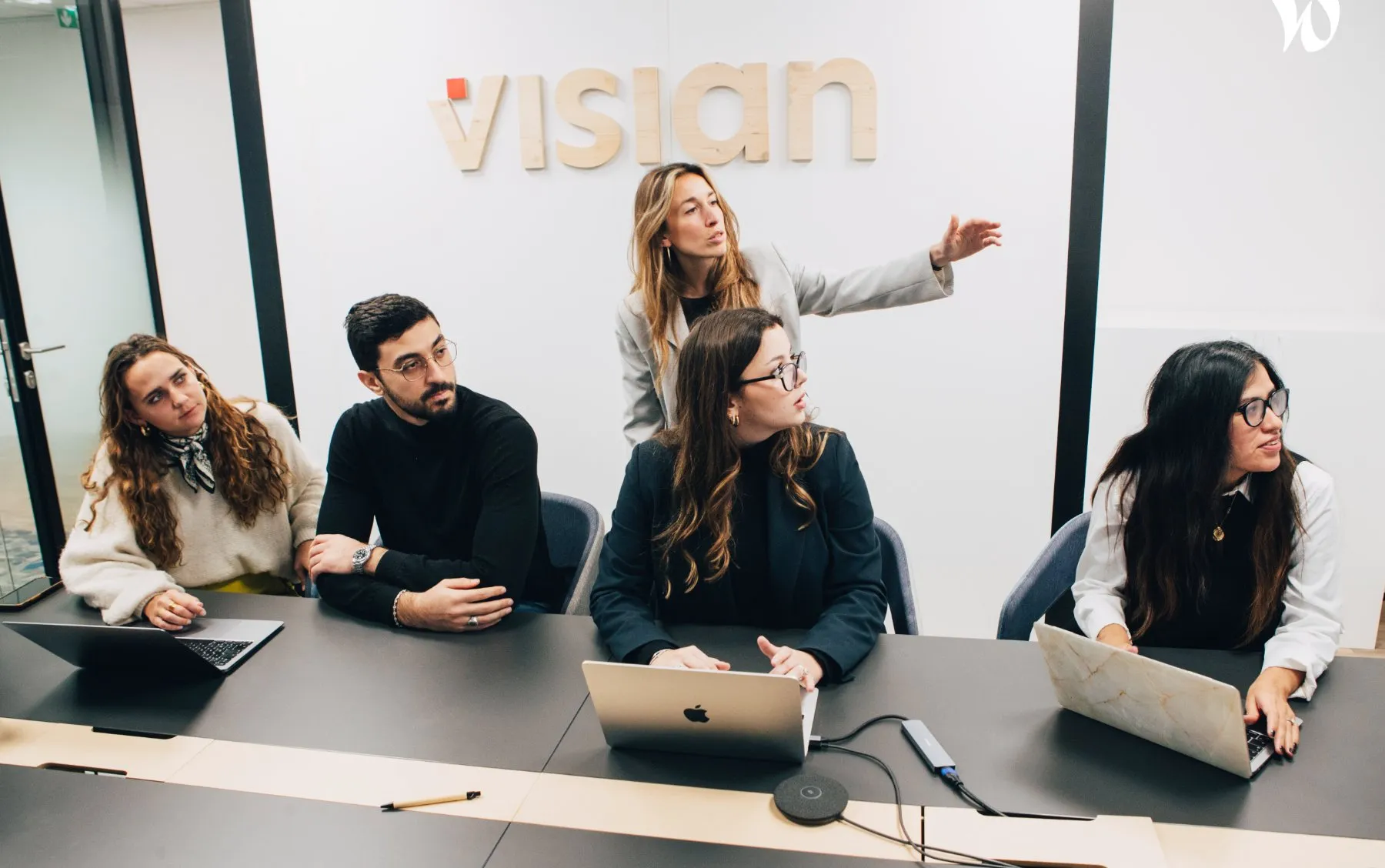 A Visian consultant presenting to the team at head office