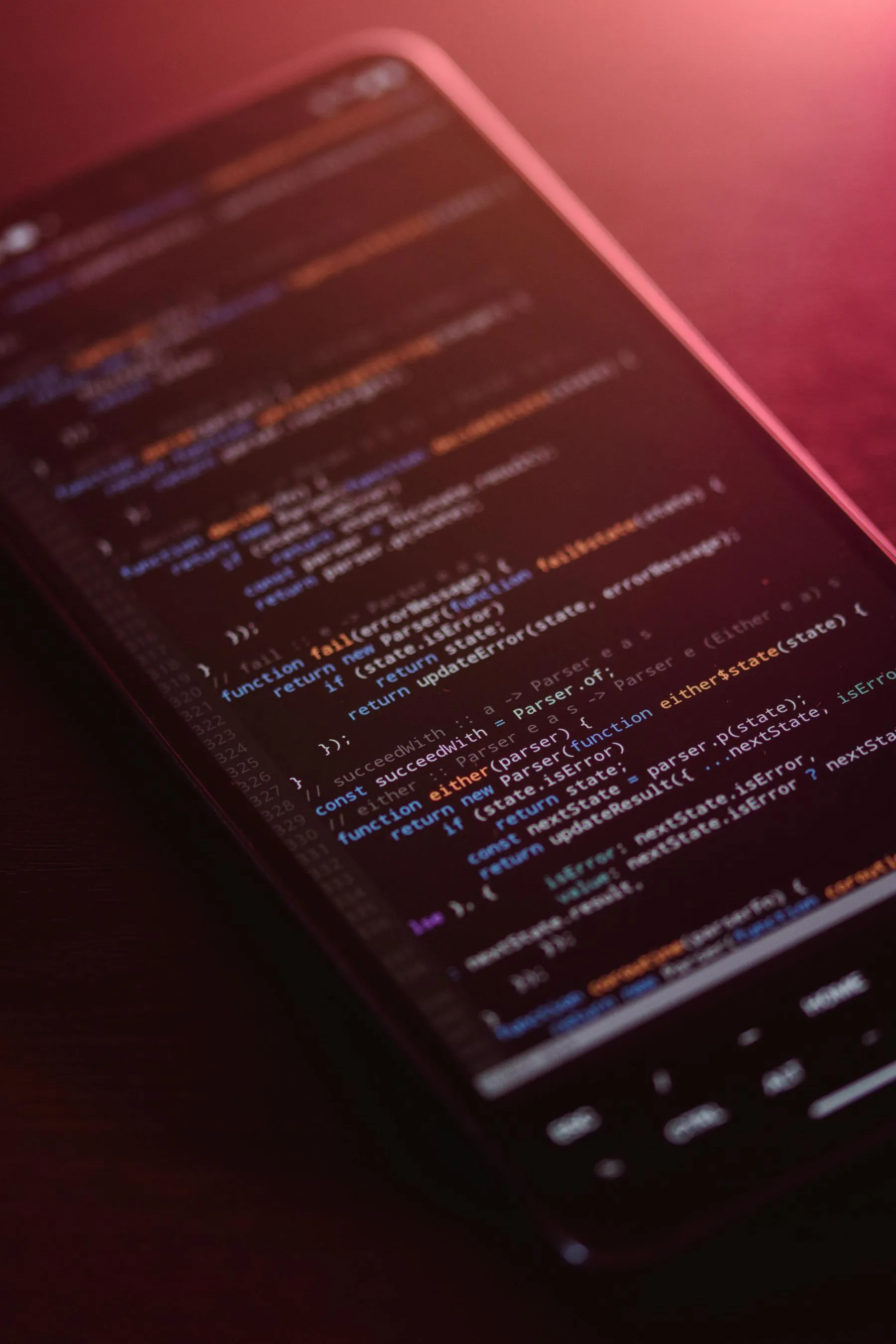 Lines of code on a red background