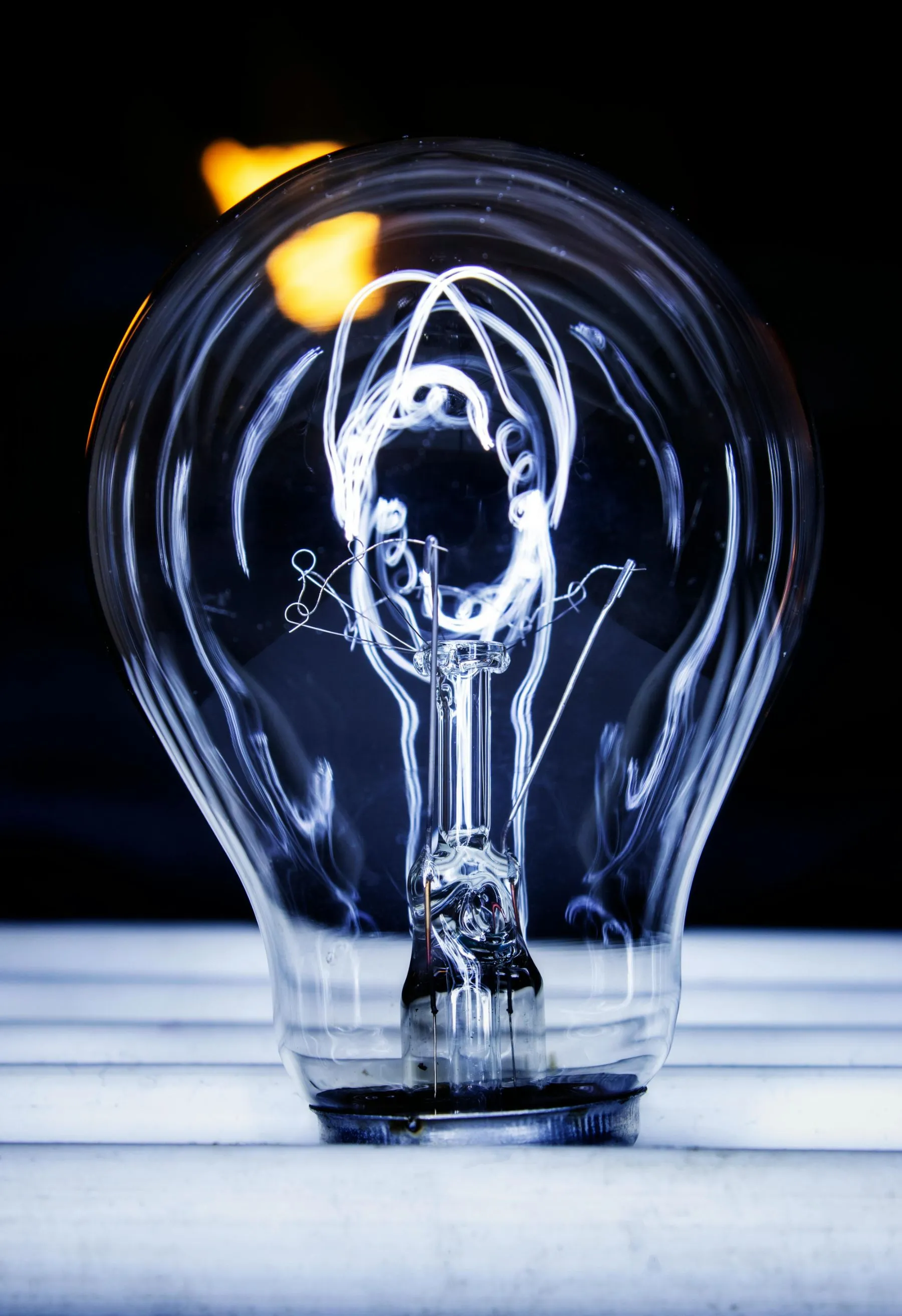 Close-up of a lit light bulb